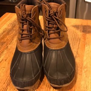 Tommy Hilfiger duck boots real leather.